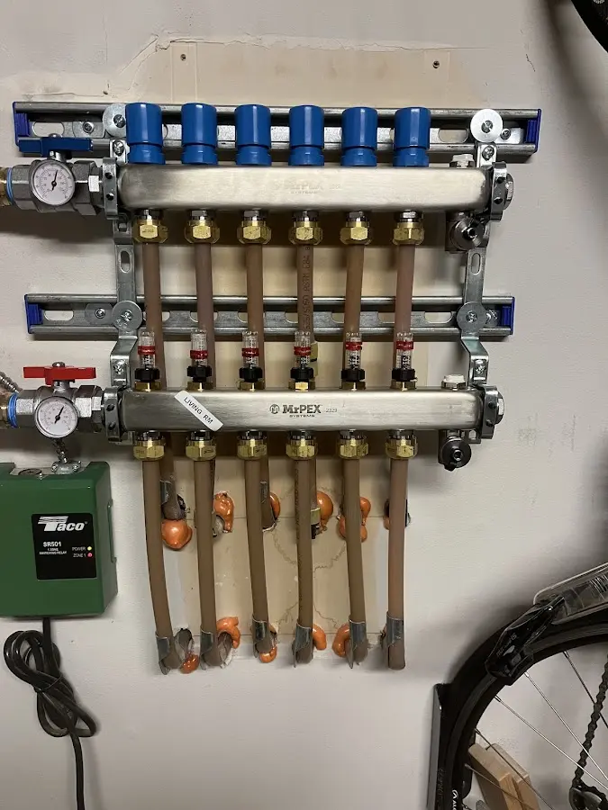 Plumber performing Water Heater Repair at a residential property in Roselle Park